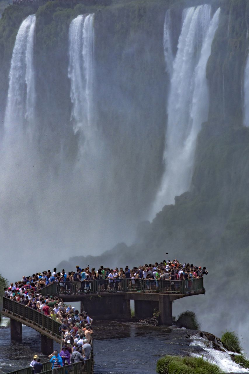 PANORAMIC VIEW OF PEOPLE ON SHORE