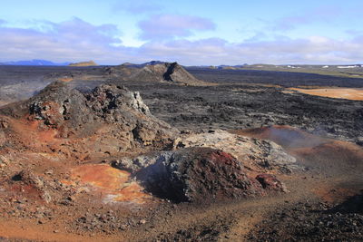 Scenic view of volcanic landscape against sky