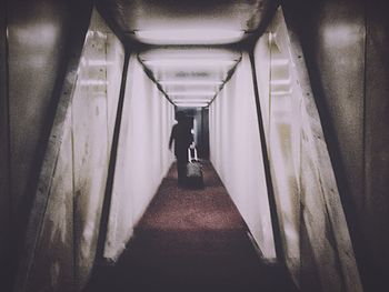People walking in tunnel