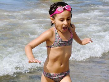 Girl running at beach