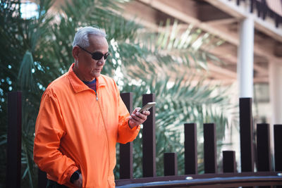 Young man using mobile phone
