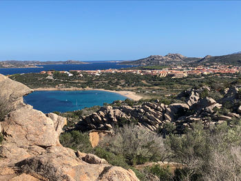 Scenic view of sea against clear blue sky