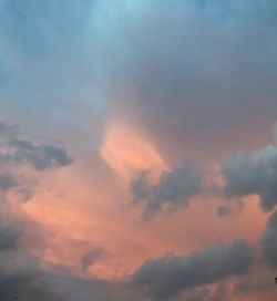 Low angle view of dramatic sky during sunset