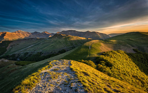 Scenic view of landscape against sky during sunset