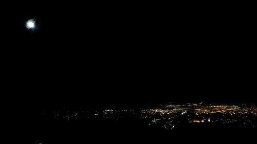 Illuminated cityscape at night