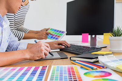 Low section of person working on table