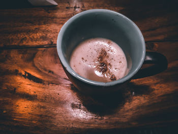 High angle view of coffee cup on table