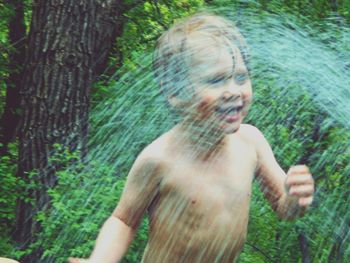 Close-up of shirtless man in water