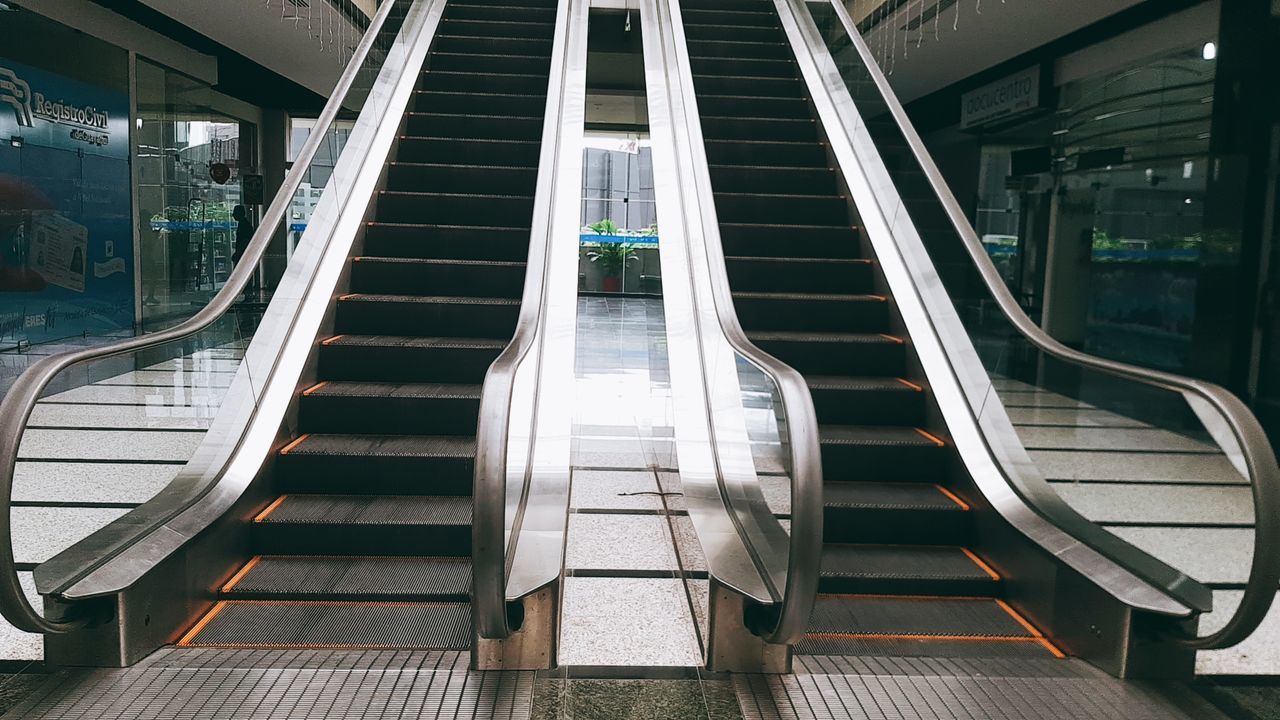 architecture, transportation, escalator, public transportation, rail transportation, built structure, empty, convenience, seat, indoors, mode of transportation, no people, railing, modern, absence, glass - material, staircase, train, travel, the way forward, steps and staircases, moving walkway