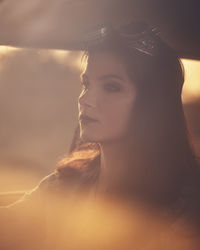 Portrait of young woman looking away