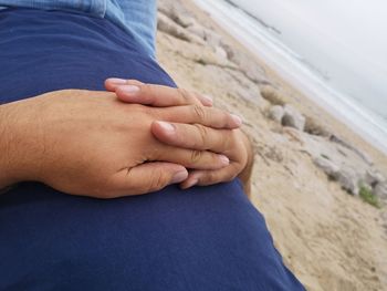 Close-up of couple hands