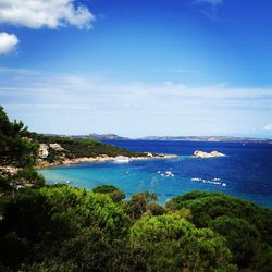 Scenic view of calm sea against cloudy sky