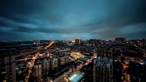 High angle view of illuminated city buildings at night in guangzhou