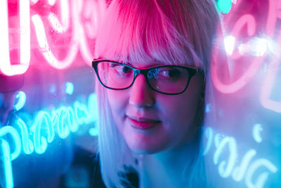 Close-up of woman wearing eyeglasses