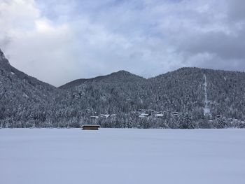 Scenic view of mountains against sky during winter