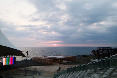 Scenic view of beach against sky during sunset