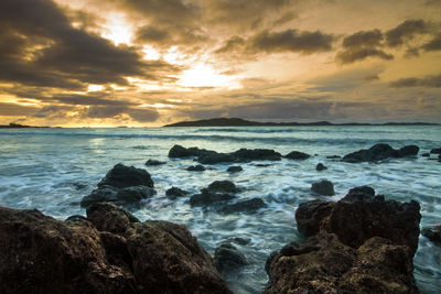 Scenic view of sea against sky during sunset