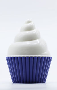 Close-up of cupcakes against white background