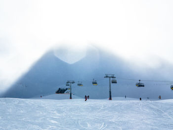 View of mountain range in foggy weather