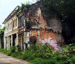 Abandoned house against sky