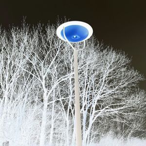 Low angle view of illuminated street light