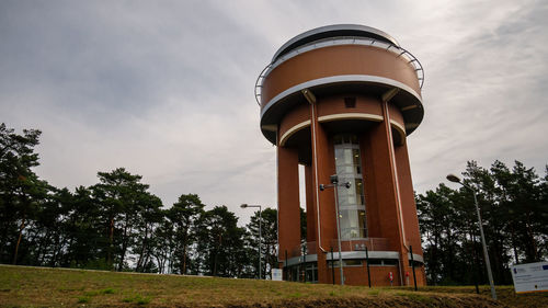 Low angle view of water tower against sky