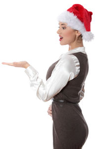 Portrait of woman standing against white background