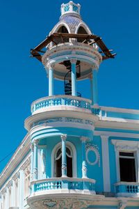 Low angle view of building against blue sky