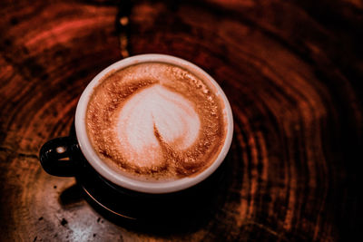 High angle view of cappuccino on table