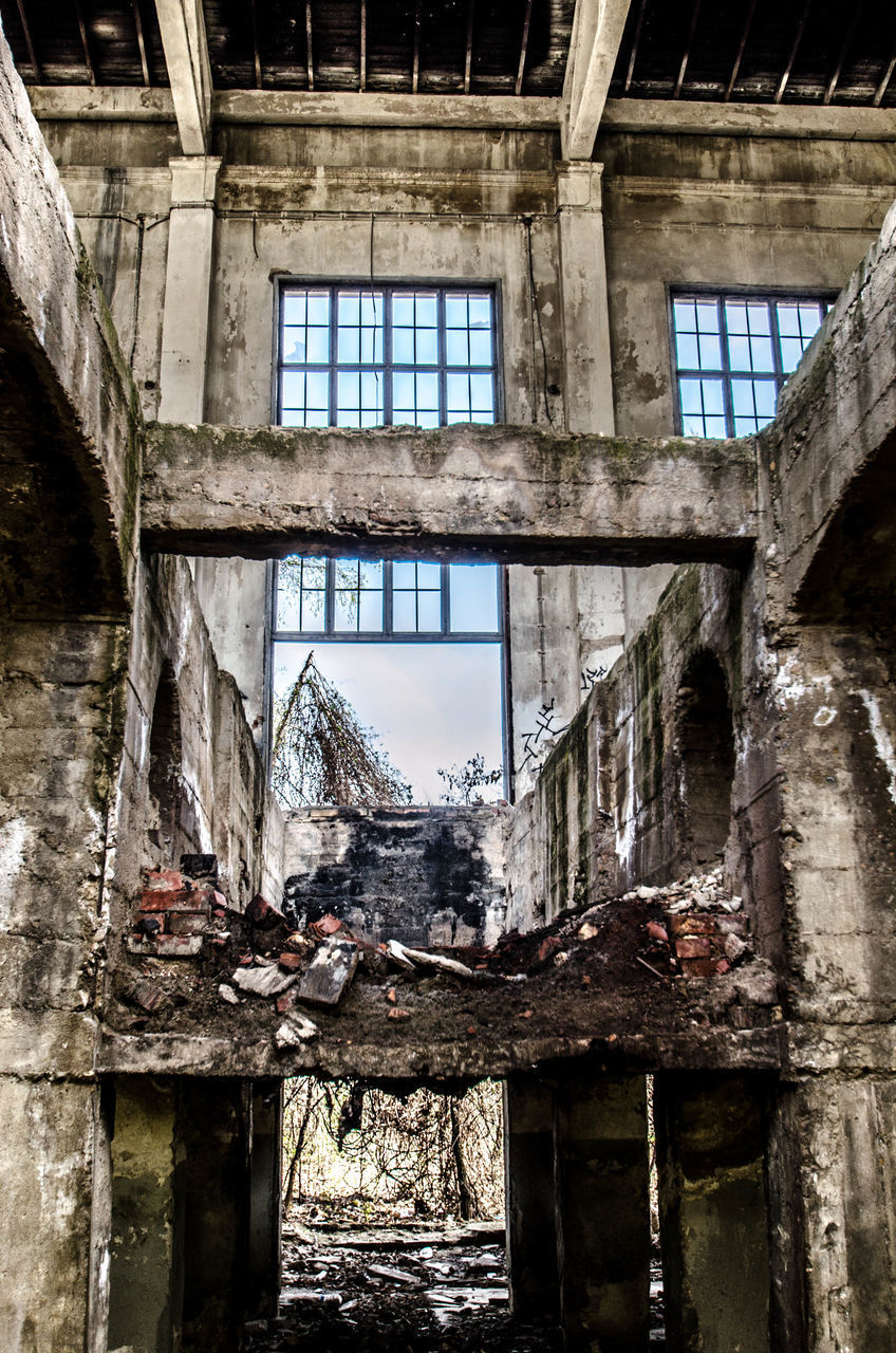 BROKEN WINDOW OF OLD ABANDONED BUILDING