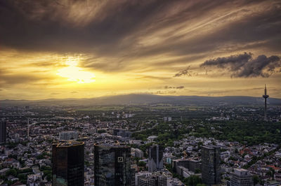 High angle view of city at sunset