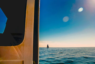 Scenic view of sea against clear sky during sunset