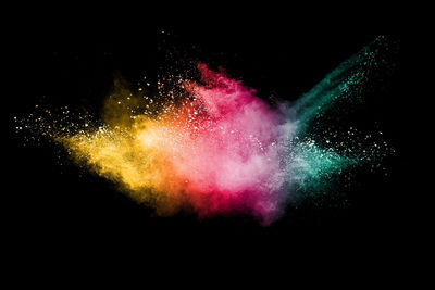 Close-up of powder paint against black background