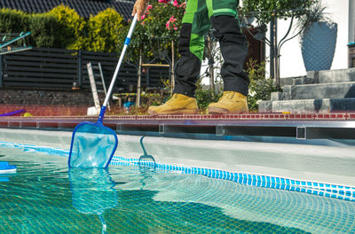 Man swimming in pool