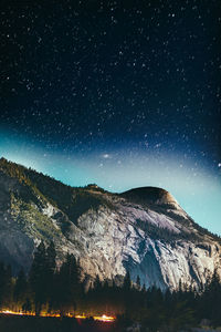 Scenic view of mountains at night