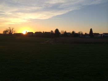 Scenic view of landscape at sunset