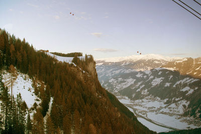 Scenic view of mountains against sky during winter