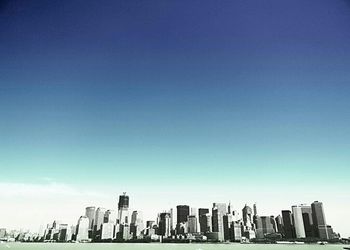 Low angle view of building against clear blue sky