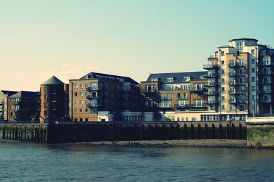 Buildings in distance with waterfront