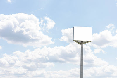 Low angle view of street light against sky