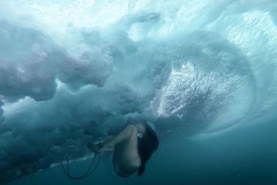 Man swimming in sea