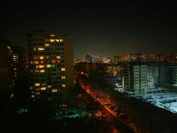 View of city lit up at night