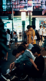 Group of people on street in city