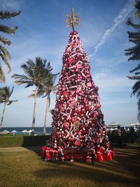 Christmas tree against sky