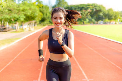 Portrait of young woman smiling