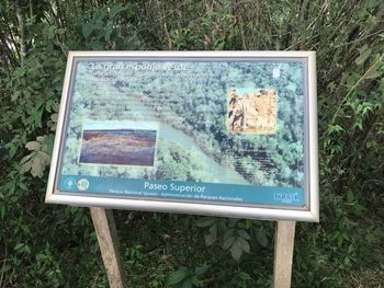 High angle view of information sign on field