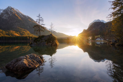 Serene sunset at lake hintersee, bavaria, germany. picturesque view of bavarian alps.