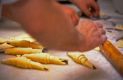 Close-up of man preparing food