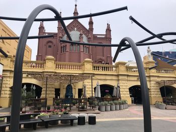 Low angle view of buildings against sky in city