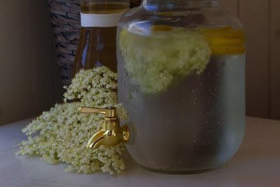 Close-up of glass jar on table